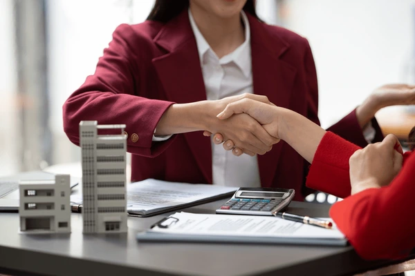 asian-businesswoman-making-deal-buy-600nw-2239457673